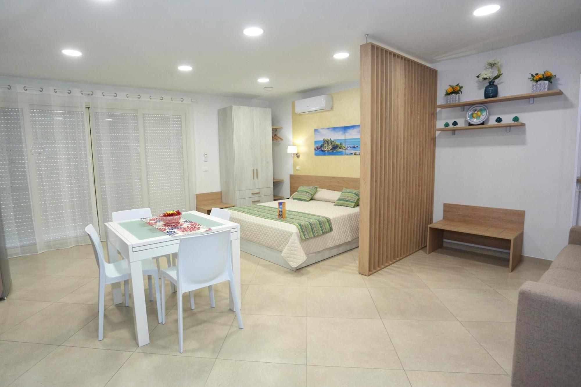 Theos Holidays Apartments จีอาร์ดีนี นักซอส ภายนอก รูปภาพ