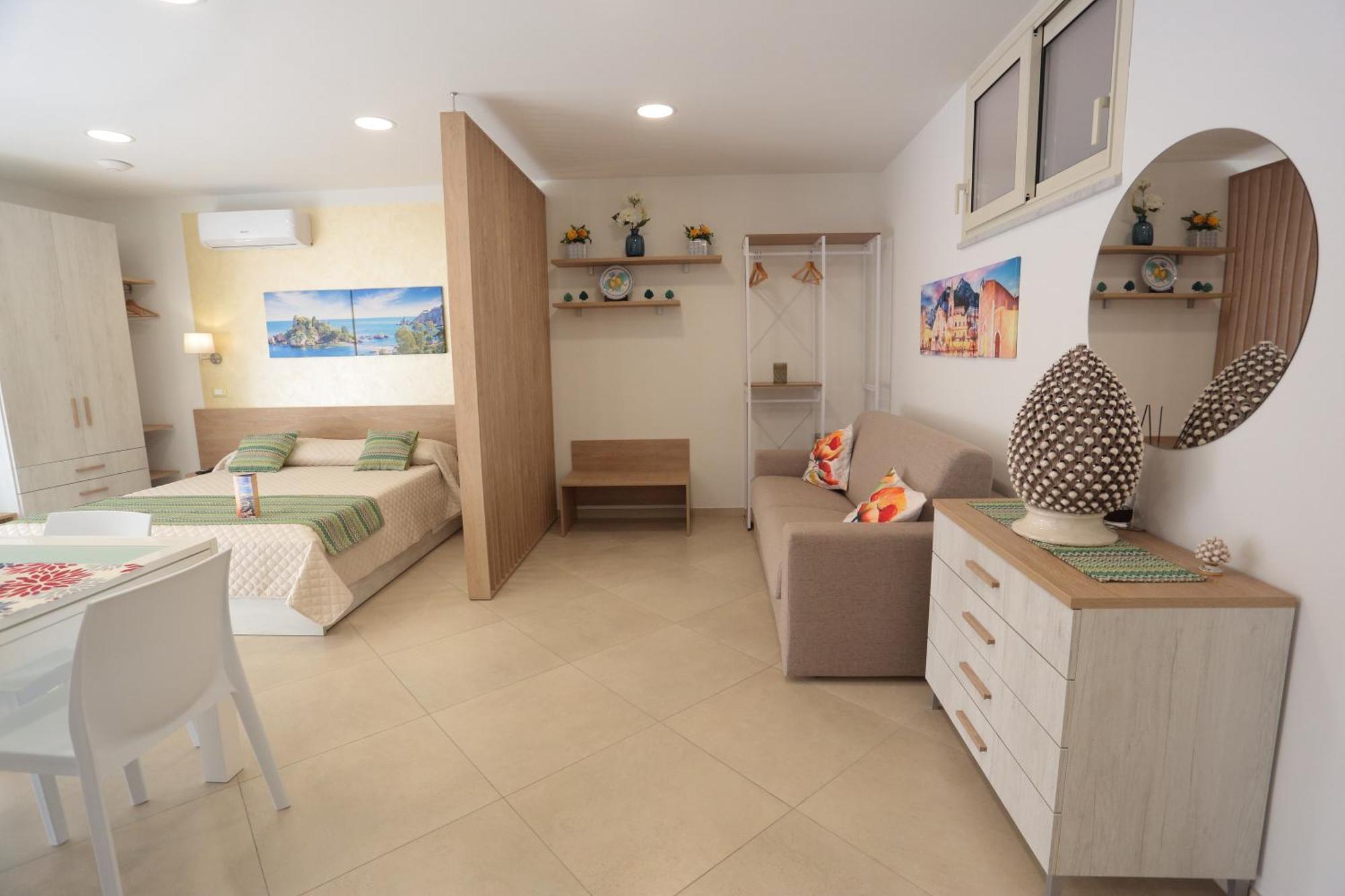 Theos Holidays Apartments จีอาร์ดีนี นักซอส ภายนอก รูปภาพ