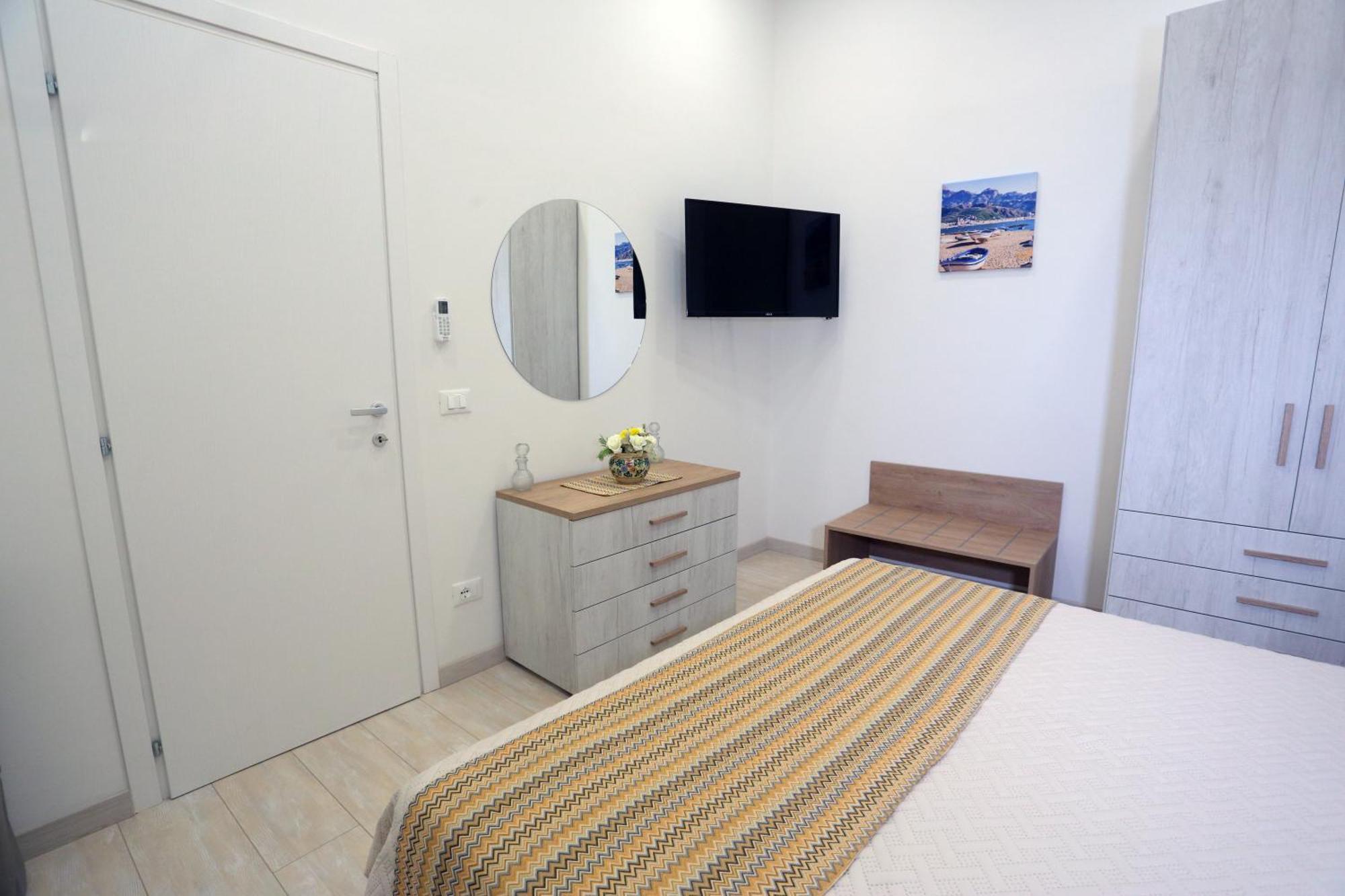 Theos Holidays Apartments จีอาร์ดีนี นักซอส ภายนอก รูปภาพ