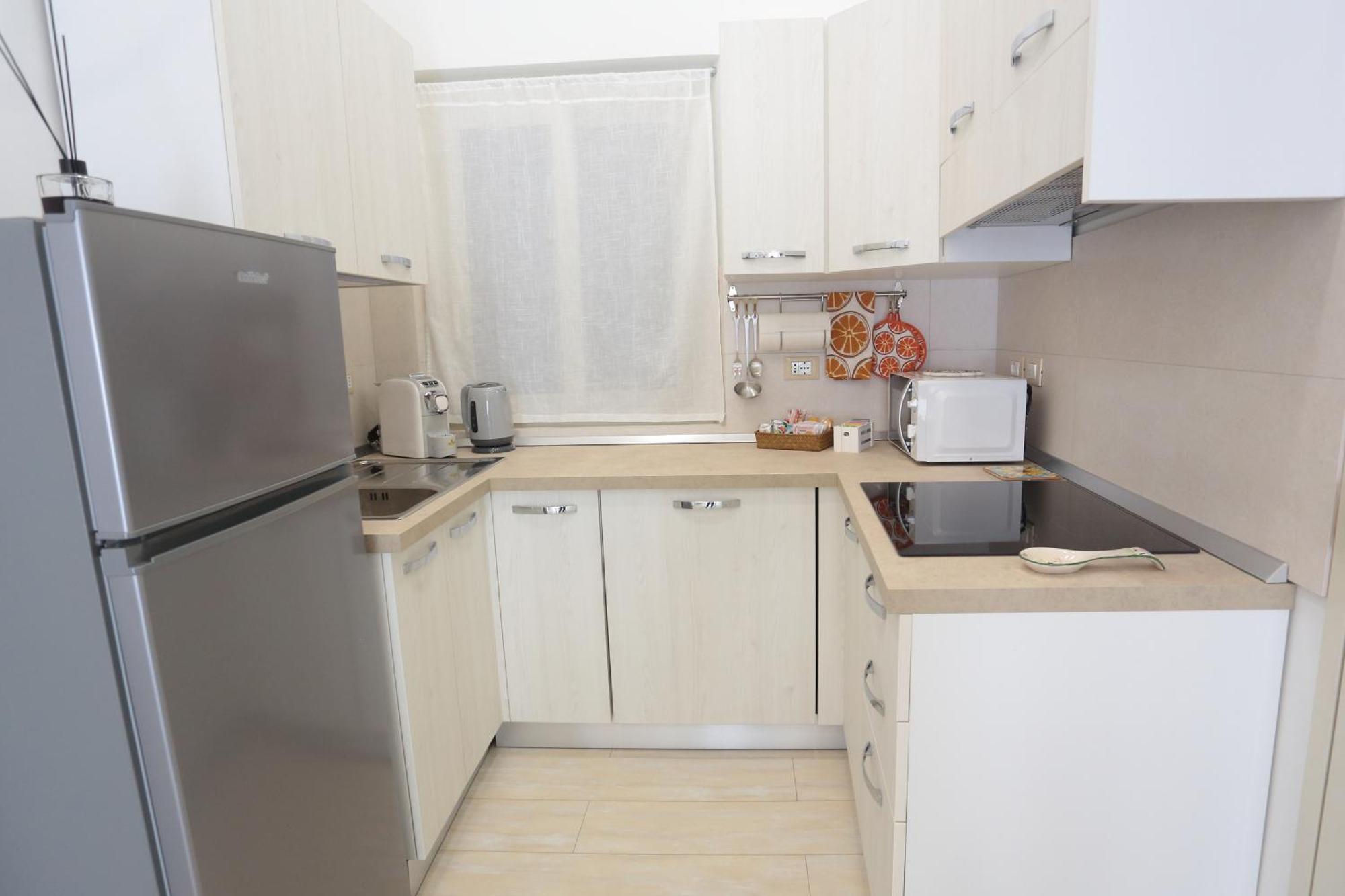 Theos Holidays Apartments จีอาร์ดีนี นักซอส ภายนอก รูปภาพ