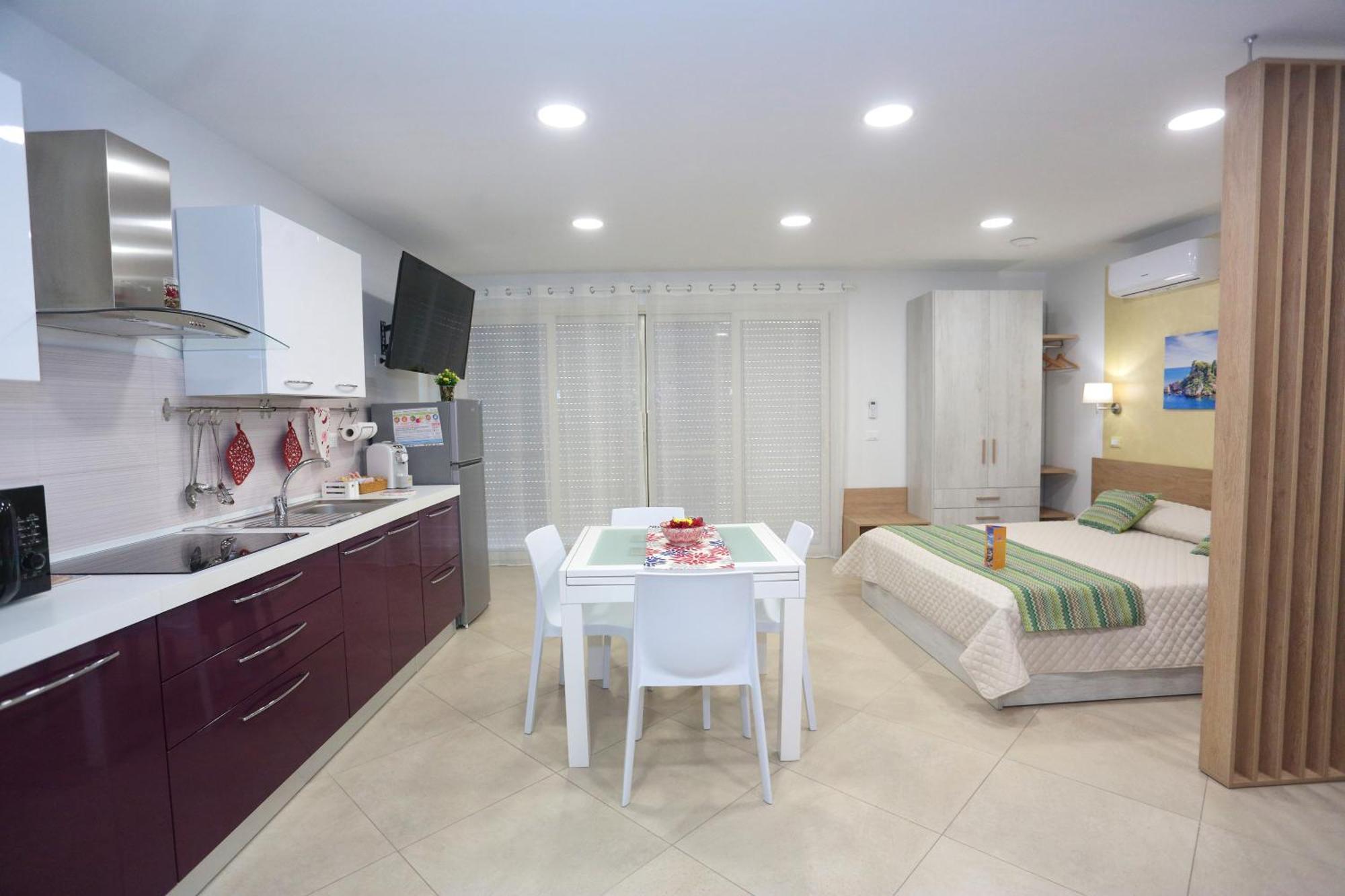 Theos Holidays Apartments จีอาร์ดีนี นักซอส ภายนอก รูปภาพ